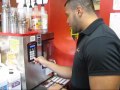 Joey makes a Strawberry Blast protein shake at Retro Fitness
