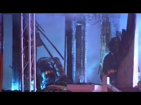 Four people rushed to hospital after Burnham St. house fire