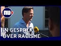Premier Rutte gaat met demonstranten gesprek over racisme aan | NU.nl