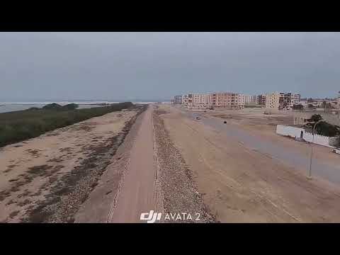 Dahraiz Beach Walk | Scenic Coastal Walkway with coconut trees & modern buildings | Oman Travel