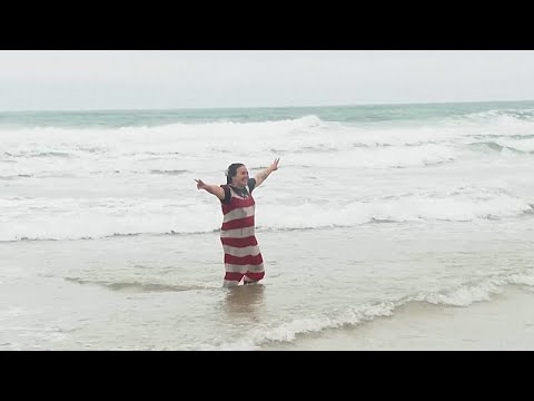 Swimmers brave traditional New Year’s sea dip at Carcavelos beach near Lisbon
