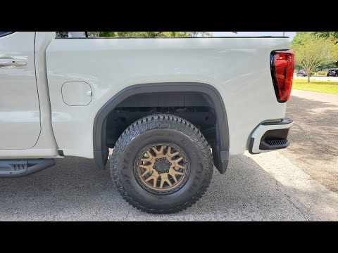 Raceline Krank wheels 17x9 -12 offset wrapped on 35s on a GMC Sierra AT4.