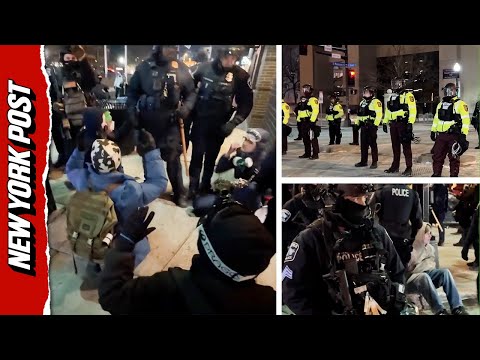 Chaos Outside Minneapolis Hotel as Police Arrest Dozens at Anti-ICE Protest
