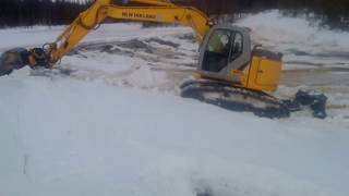 preview picture of video 'New Holland Kobelco E 150 BSR Blade runner'