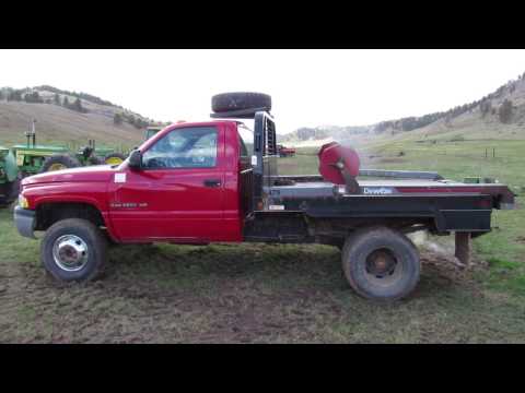 1999 Dodge 3500; 4x4, DewEze 475 bale bed | HiBid Auctions