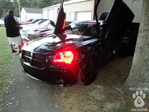 Black Dodge Magnum SRT-8 on 24/26 Savini @ Bat96Chevy Cookout