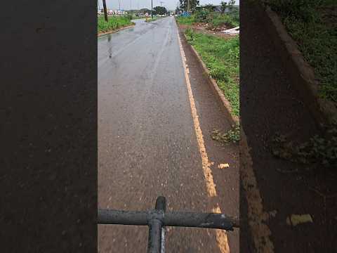andando de bicicleta  na chuva, UNAI-MG