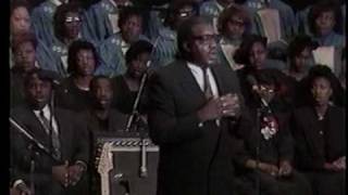 Pastor T.L. James sings 
