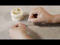 Creativ Company Auffädelhilfe Perlenkarussell mit Nadel, 7 x 7 cm