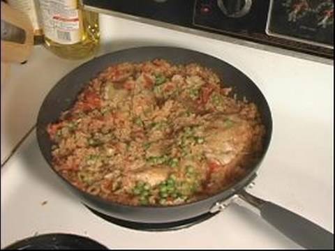 How to Make Arroz Con Pollo : Adding Adobo & Sazon for Arroz Con Pollo
