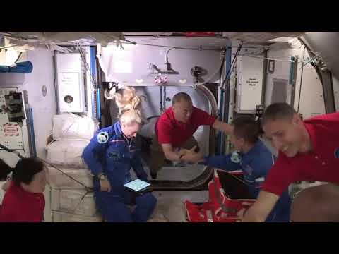 Hugs, high fives as astronauts enter ISS after SpaceX docking | AFP