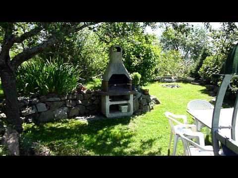 Ferienhaus Schwarzwald Gartenanlage Ferienwohnungen Suedterrasse im Sommer