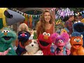 Sesame Street Miley Cyrus Gets Imagination Lesson From Elmo Exclusive