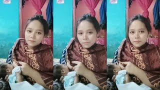 Download lagu A beautiful, sweet mother breastfeeding her newborn child mp3