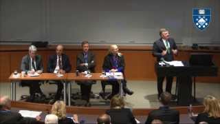 Video thumbnail for, "Ethics and Leadership: Innovation in Education." Man stand at podium speaking on stage, while four people on stage sit at desk.