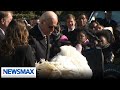 Biden offers microphone to turkey during traditional Thanksgiving pardon ceremony