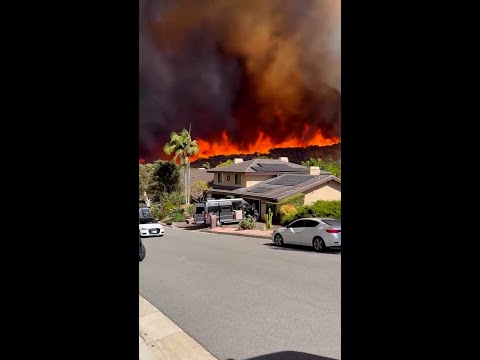 Thousands of homes threatened by California wildfires