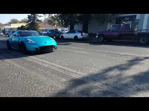 Nissan nismo 370z with GTM unresonated test pipes and Greddy revolution RS Race single exit