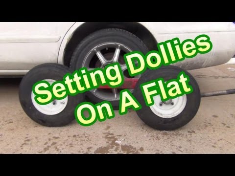 Part of a video titled Setting Dollies On A Flat Tire - YouTube