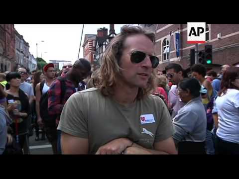 Broom wielding volunteers help with cleanup after third night of rioting