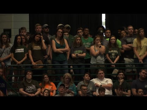 Thousands gathered inside an arena on the University of North Carolina at Charlotte campus on Wednesday to honor the victims of Tuesday's shooting that killed two students and injured four others. (May 2)
