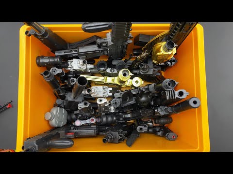 Box of Bead Gun. Dangerous Weapons. Black And Gold BB Guns!