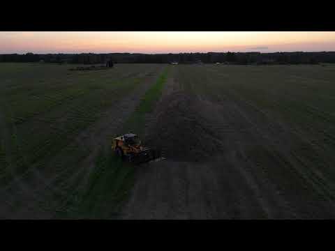 LiuGong CLG856IV Stacking Hexel Straw at Sunset