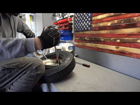 How to install a New Trailer tire on the rim with basic tools
