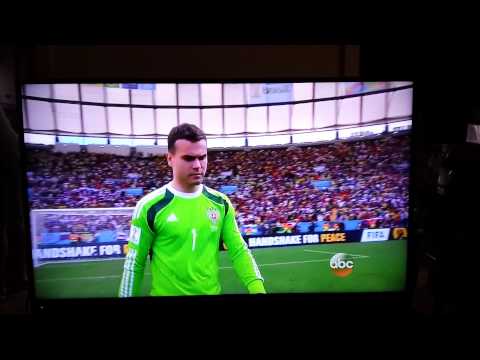 Russian goalkeeper Igor Akinfeev sprays cameraman