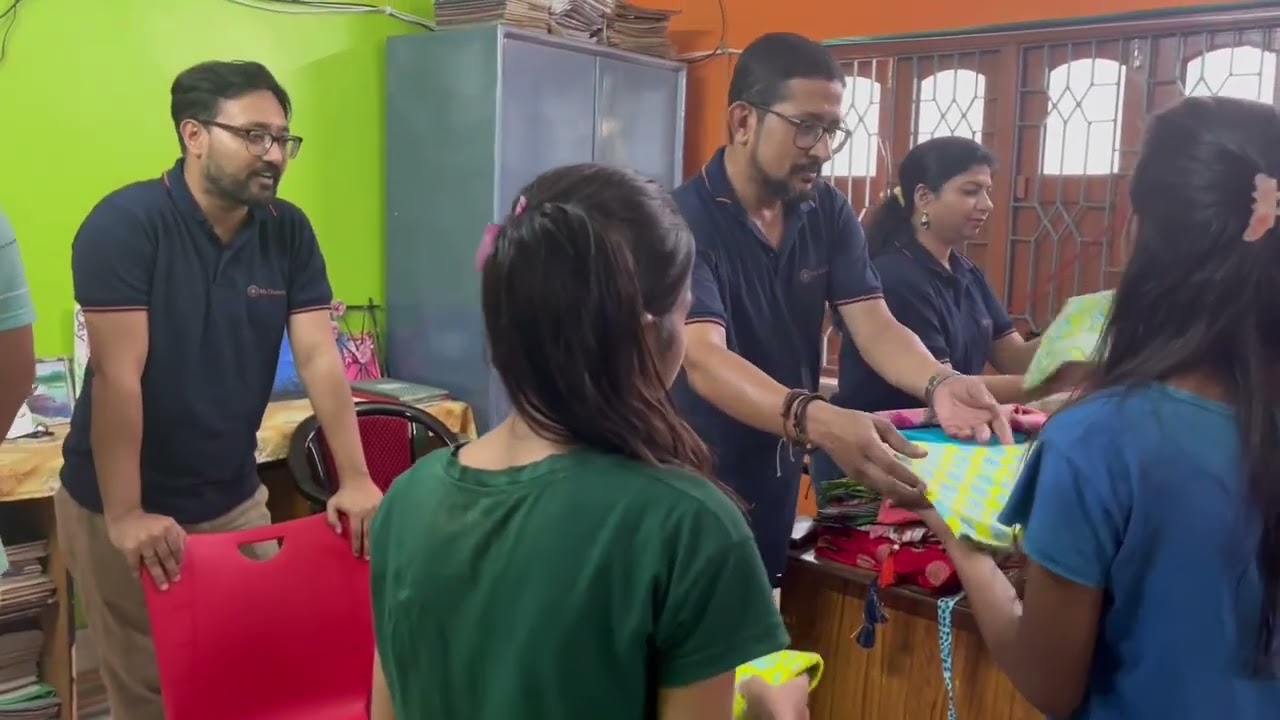 Clothes distribution to girls.