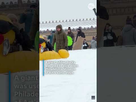 Giant ducky goes tubing, dune buggy whips in Philadelphia snow