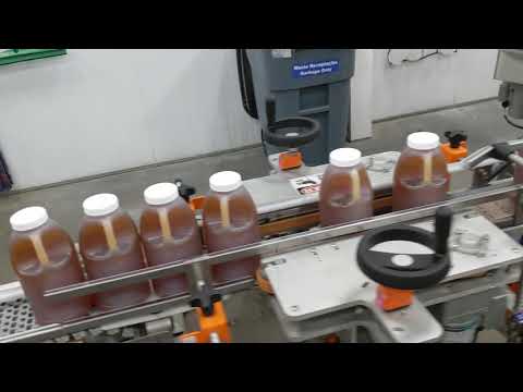 Honey jug labeling auto positioning