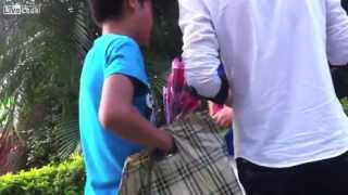 Street child workers harass pedestrians