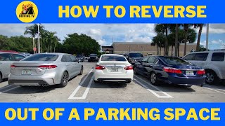HOW TO REVERSE OUT OF A PARKING SPACE (Driving Tutorial for beginners)