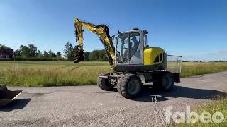 Wacker Neuson EW100 Hjulgr&auml;vare med massa redskap (136178) Mobilbagger | Bild 2 - Machineryline