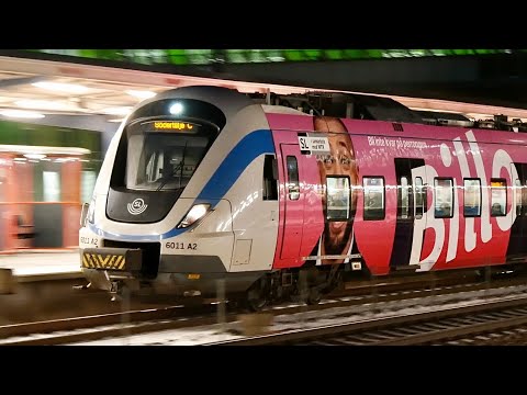 Commuter trains at Älvsjö station in the dusk | X60 and X60B