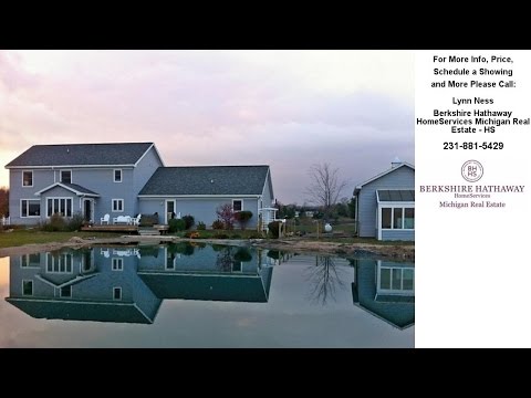 523 Alcan, Petoskey, MI Presented by Lynn Ness.