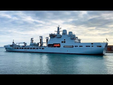 RFA Tidesurge dusk departure from Portsmouth