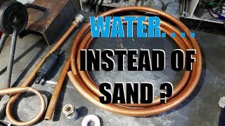 Trying water instead of sand to form a copper coil for water heater