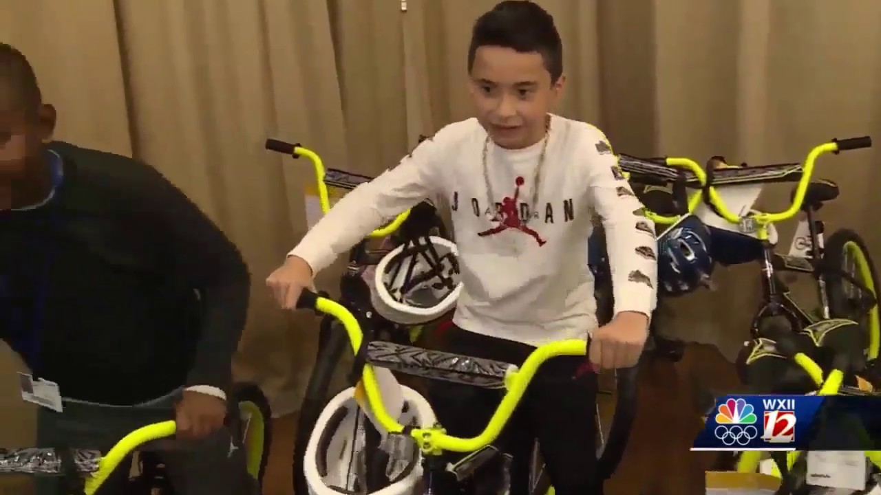 Jaws drop when 3rd-graders at Peck Elementary School learn they are all getting new bicycles