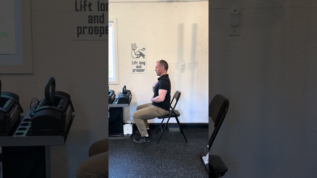 Seated Hook Breathing (Side View)