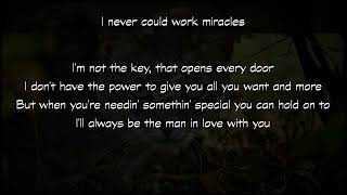 The man in love with you - George Strait lyrics