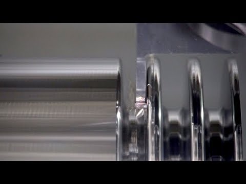 Profiling with long overhangs in narrow grooves - CoroCut® QD