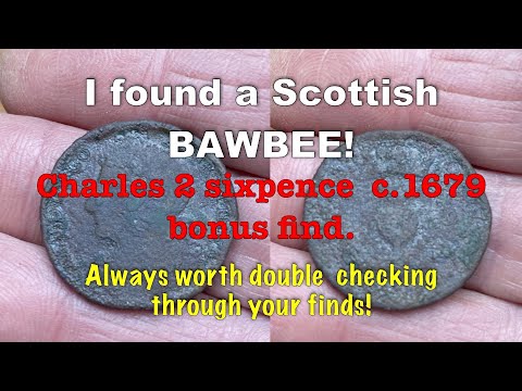A BAWBEE!  I found a Scottish Bawbee, a Charles 2nd sixpence c.1679.  Worth checking your finds.