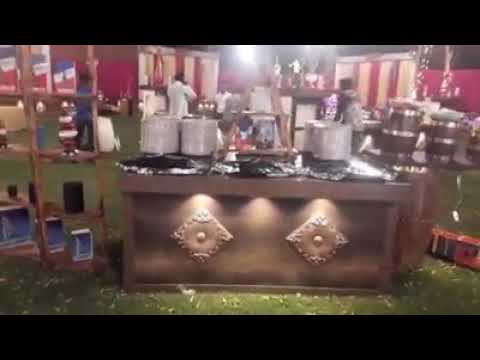 Unique wooden display of salad and plate counter in party