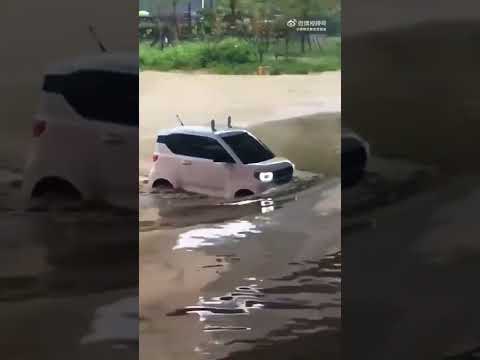 Thumbnail for 2021 WULING HONGGUANG MINI EV Macaron Thru Flood Puddle, Mobil Listrik Genangan Banjir (IP68 Proven) by Troller, Wheelbase, Wuling Hongguang V, SEAT, video, Kei car, WiLL, Car, Vehicle, vide