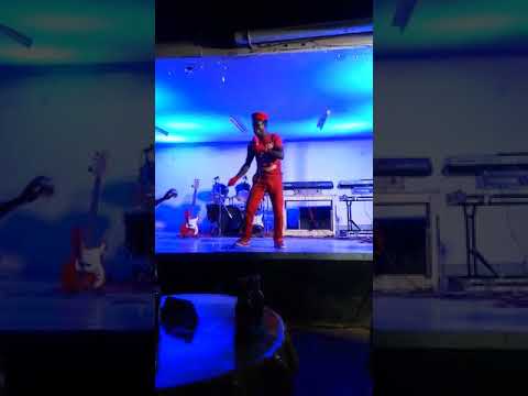 Bobi Young performing on stage