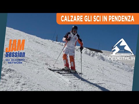 Calzare gli sci in pendenza - INT.11 - Corso di sci intermedio