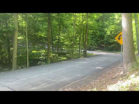 NB Miata With ISR exhaust echoing through mountain road