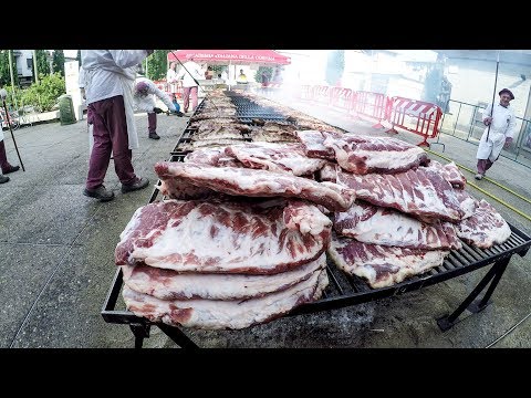 HUGE Spare Rib Grill Cooking Tons of Meat Seen in a Town Fair in Italy. Italian Street Food